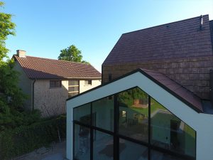 Roofing and ventilated façade with Flat-10 Tokyo Copper roof tile
